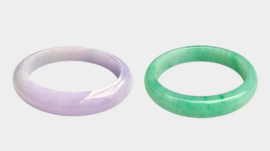 a lavender jade bangle and a green jade bangle side by side